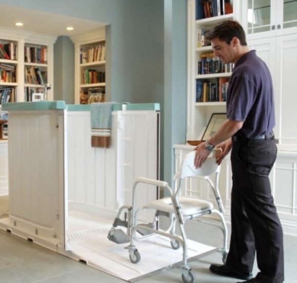 Image of a man demonstrating the shower bay